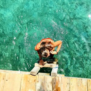 Girl in the water in Utila, Honduras
