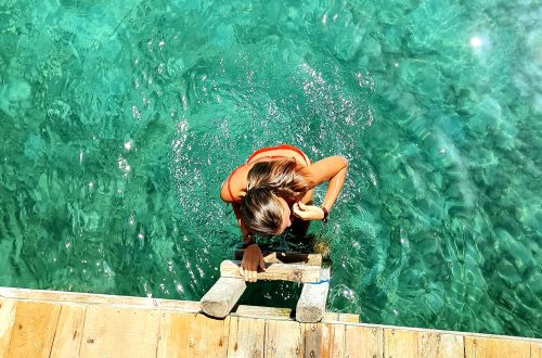 Girl in the water in Utila, Honduras