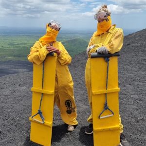 Volcano Boarding - 2 girls holding their boards on Cerro Negro
