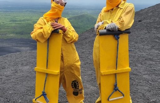 Volcano Boarding - 2 girls holding their boards on Cerro Negro