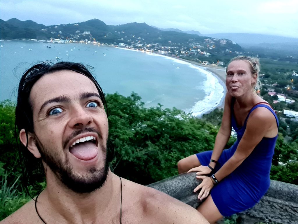 Two people having fun in San Juan del Sur, Nicaragua