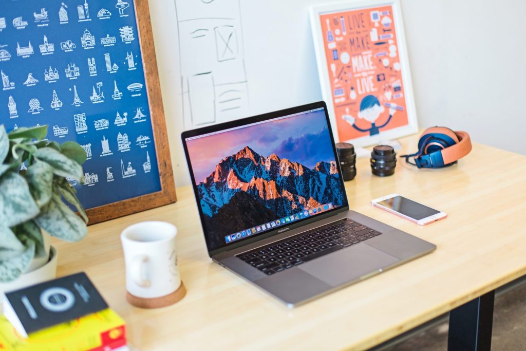 How to become a digital nomad: invest in the right gear as on the picture with a laptop and so on
